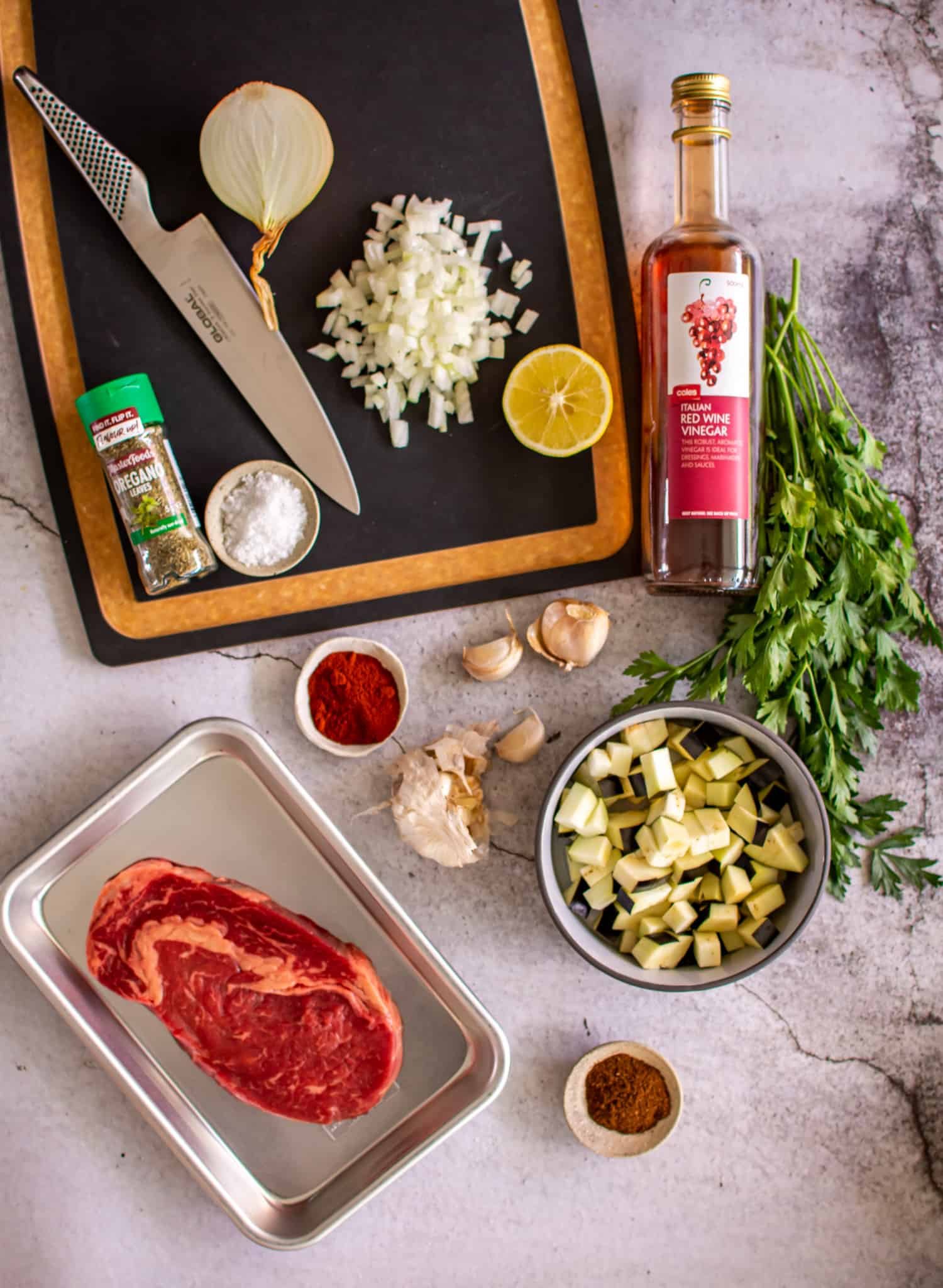 Ingredients needed to make steak and spiced eggplant 