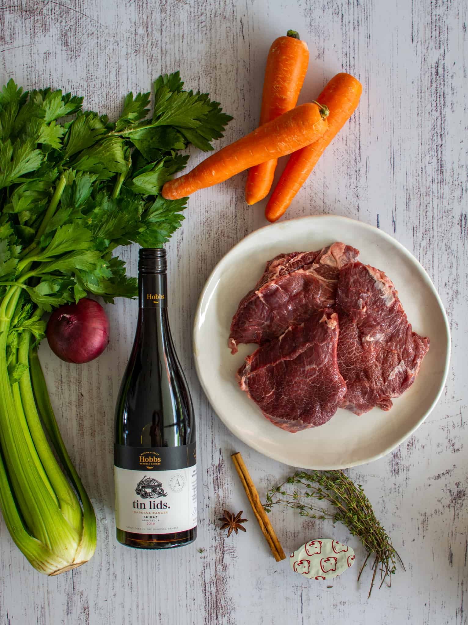 Birdseye view of ingredients to make beef cheek ragu