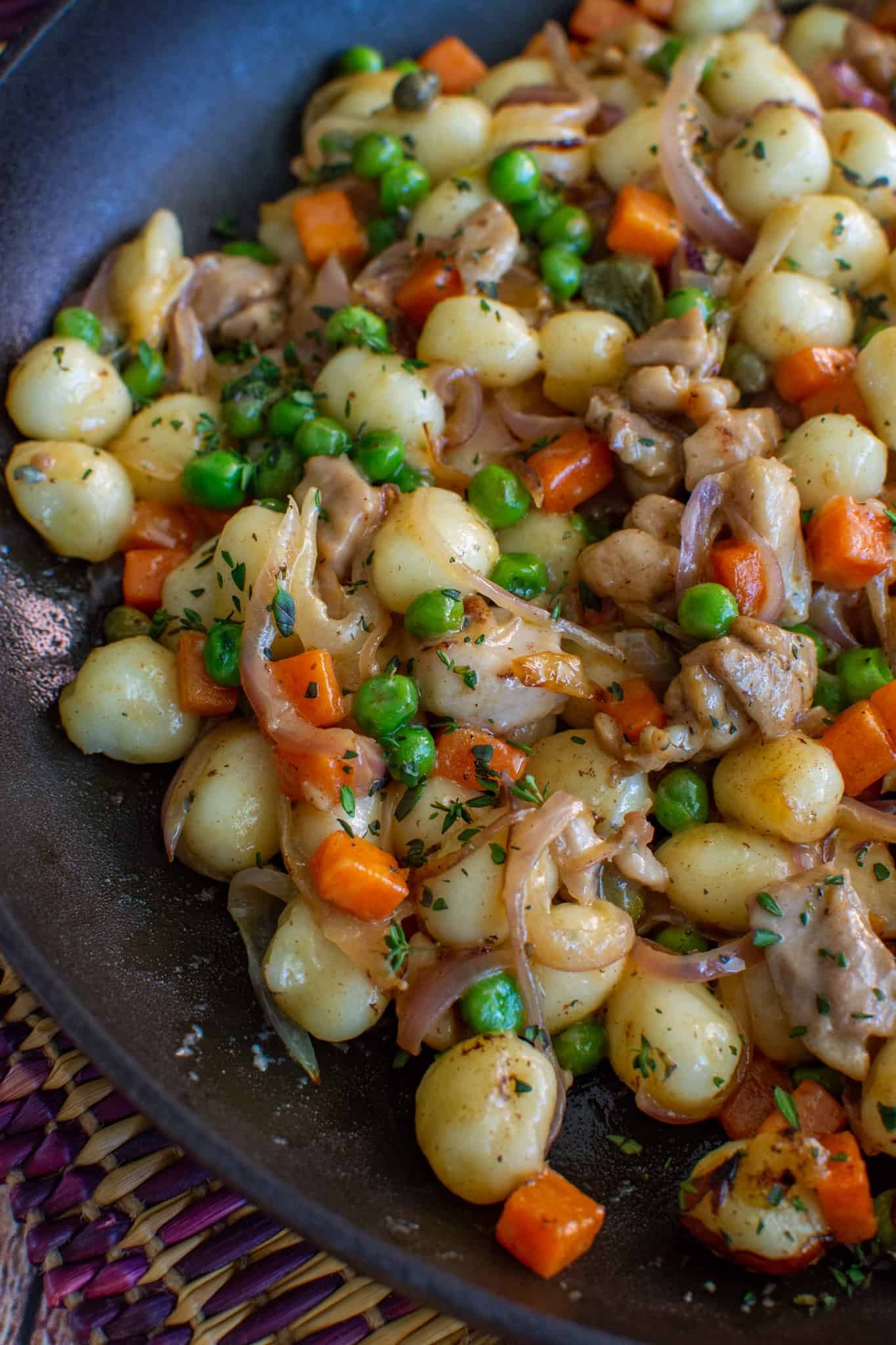 Chicken, vegetable & blue cheese gnocchi in a frying pan 